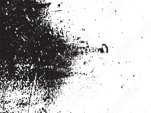 A high-contrast abstract splatter in black and white. The artwork features a mix of textures, rough edges, and subtle gradations from dark to light, creating a dynamic visual.