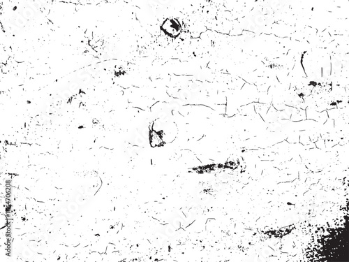 The image shows a white surface texture with extensive cracking. Black smudges and spots indicate aging and wear, creating an abstract, aged aesthetic effect.