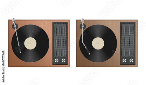 Two vintage-style record players are positioned next to each other. These feature black vinyl records and integrated speakers for a nostalgic audio experience.