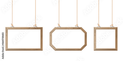 Three different shaped wooden frames are suspended by tan ropes. A rectangular, octagonal and square shape provides a modern display, all against white backdrop with copy space.