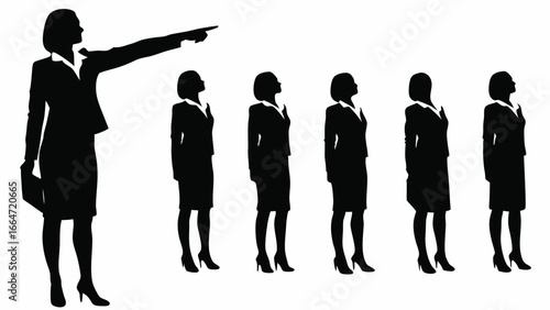 Silhouette of a businesswoman pointing forward with a group of women looking up in the same direction