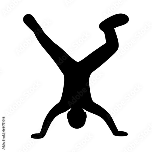 Silhouette of a person performing a handstand with legs apart and bent