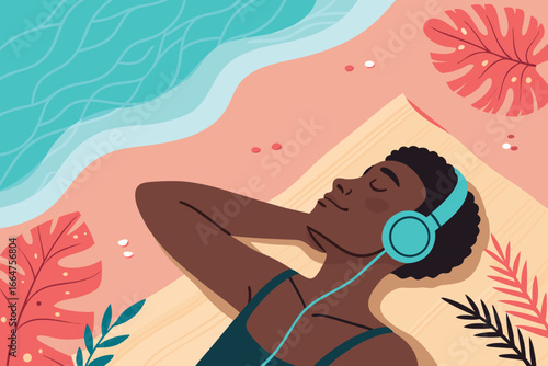 Person with headphones lying on a towel listening.