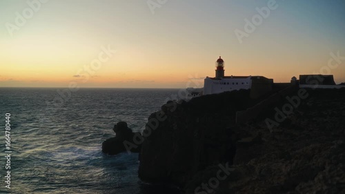 Experience the stunning sunset at Cape St. Vincent Lighthouse in Sagres, Portugal along the breathtaking Atlantic coast