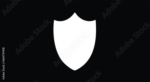 White Shield Icon Isolated on Black Background: Symbol of Security and Protection