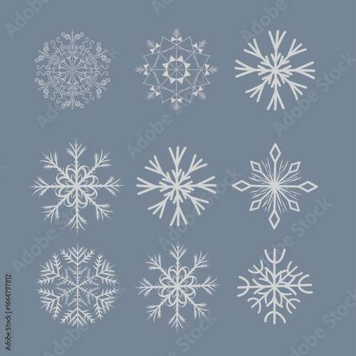 A collection of intricate snowflake designs in various shapes and patterns