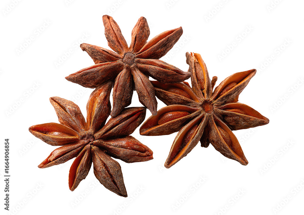 Close-up of three star anise spice, rich brown tones, overlapping, isolated on black Close-up of three star anise spice, rich brown tones, overlapping, isolated on black