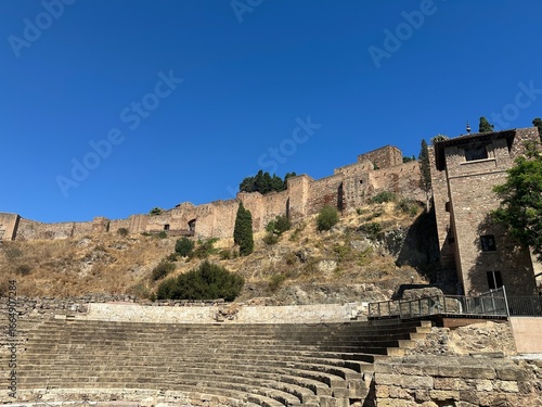 Ancient ruins of Roman theatre below Alcazaba fort in Malaga, Costa del Sol, Andalusia, Spain