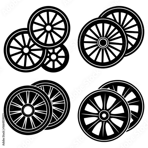 A collection of four sets of stylized wagon wheels in black and white with spoke designs shown