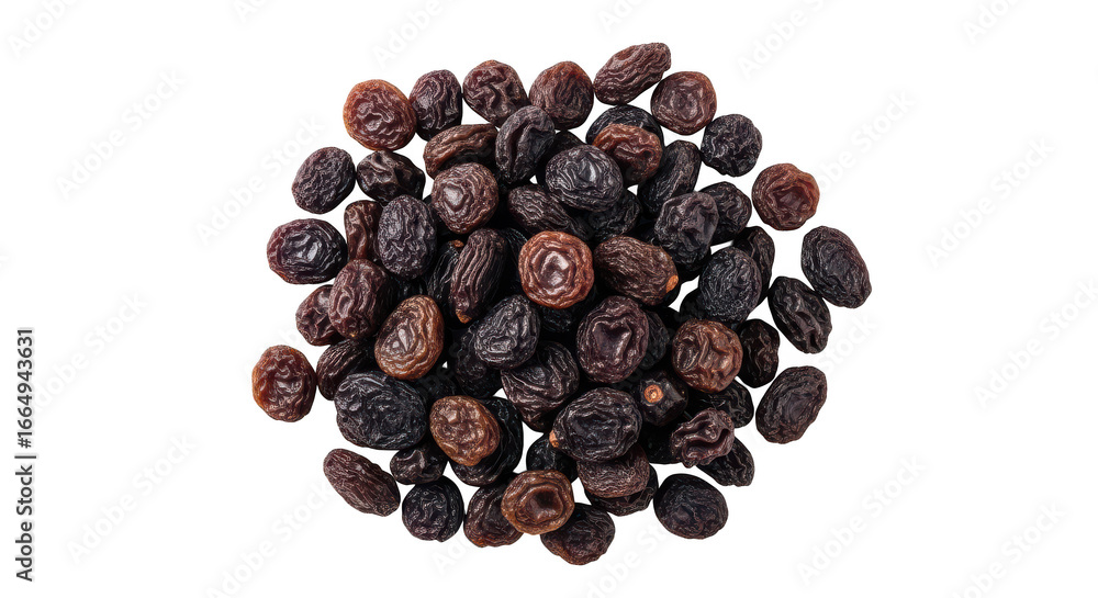 Fototapeta premium Dark Raisins Scattered on a Background Dried Fruit Close Up food
