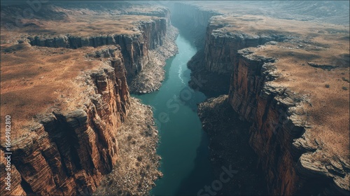 Aerial view of a river flowing through a canyon, desert landscape background, travel brochure use