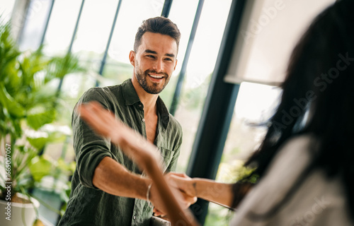 Modern, inclusive, and collaborative atmosphere in the office. They warmly welcome the new colleague