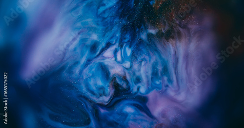 Paint mix. Blur bokeh art. Defocused blue purple multicolor wet texture liquid water floating on abstract dark black creative background.