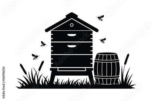Beehive with bees and honey barrel in a field silhouette