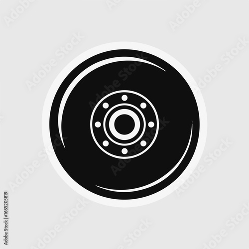 A sleek black and white sticker of a car wheel isolated on white background, representing automotive design, transportation, and the mechanics of vehicle engineering