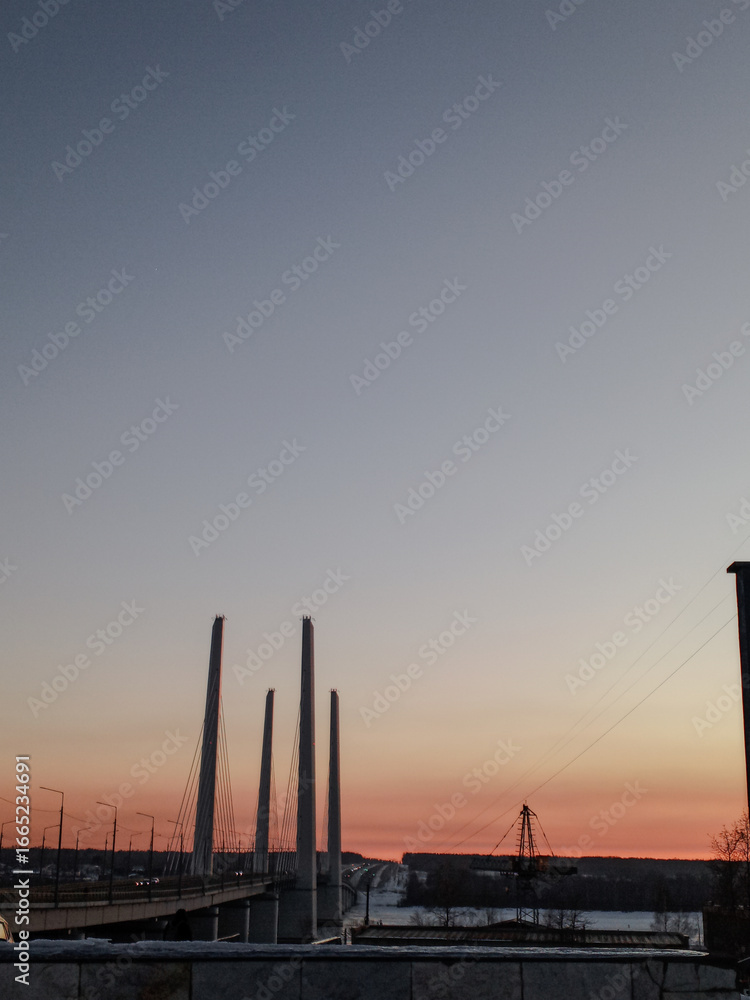 Naklejka premium sunset over the city