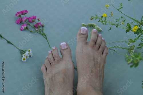 Close-Up of Woman's Feet with French Pedicure