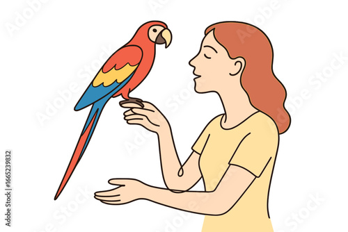 Woman interacts with colorful parrot in a friendly moment at home