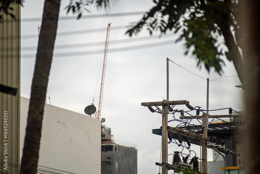 Fototapeta premium Urban Construction and Power Lines View