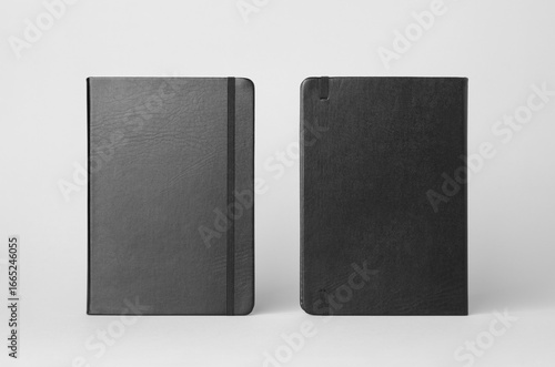 Notebook mockup showing front and back cover on a gray background