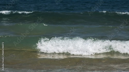 Experience the beauty of slow-motion ocean waves crashing on the shore. This relaxing nature stock footage is perfect for meditation, backgrounds, travel videos, documentaries, and creative projects.