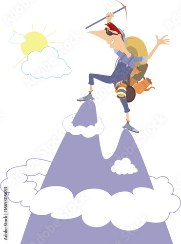 Traveler man climbing the mountain. 
High mountains. Happy rock climber stands on the mountain
