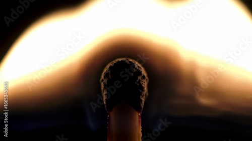 Close-up captures the flame of a burning matchstick against a dark, smoky background, concept for ignition sequence, philosophical metaphor and striking imagery