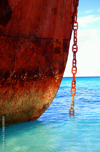 rusty anchor on the beach