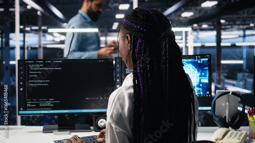 Canvas Print Technicians in data center review AI diagnostics, analyzing neural network performance to maintain operational reliability