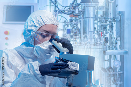 Woman lab technician using ...