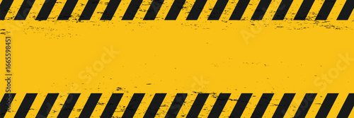Grunge texture in black and yellow hazard style. Abstract warning background for poster, banner, sign, industrial design, and safety themed graphics.
