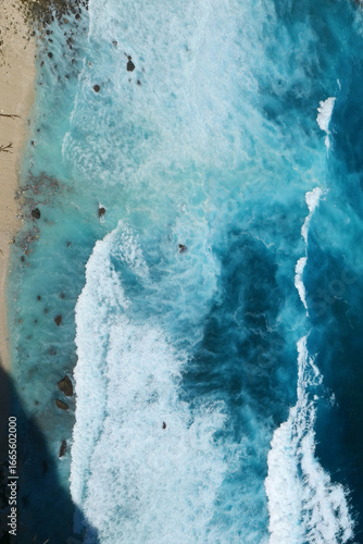 Wallpaper Mural Vertical Horizon Seascape dark ocean background wave splash rock. Tropical sea beach in summer seaside outdoor. Vertical Water Surface blue Turquoise ocean sea wave pattern splashing deep blue sea Torontodigital.ca