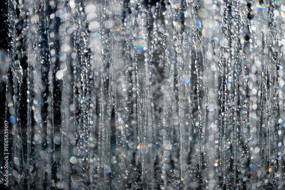 Obraz premium Water drop background. Drop pattern. Drop motion. Drop texture. Droplet background. Water splash background. Water droplets banner. Rippling water background. Splash motion.