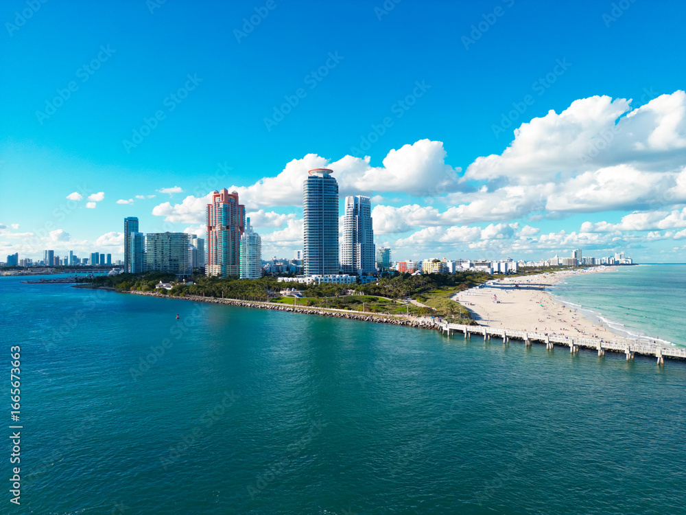 Naklejka premium Miami Beach aerial drone view with skyline. Miami from above. Drone view of Miamis famous landmarks. South Pointe beach with skyscrapers. Miami city panorama. Skyline of Miami Beach.