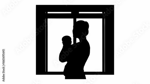 Silhouette of mother holding baby in front of window with natural light streaming through the glass pane