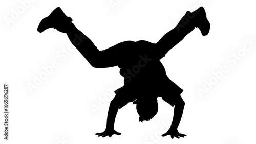 Silhouette of a person doing a handstand with legs spread wide against a white background in a studio shot