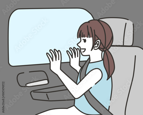 女の子が車の窓から外を眺めて笑顔になるシーン