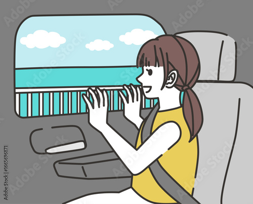 女の子が車の窓から海の景色を眺めて喜ぶ夏休みの旅行