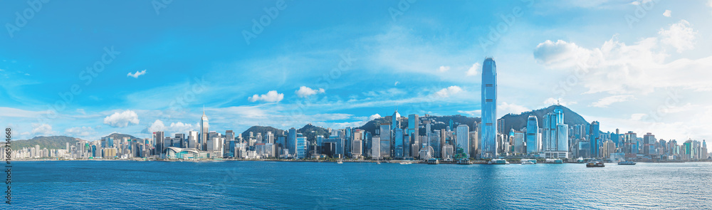 Naklejka premium Latest August 2025 Hong Kong panorama skyline Victoria Harbor in day time