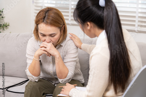 Fototapeta Counselor, psychologist, family therapy session, mental health, woman coping wit