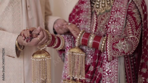 A Slow Motion Shot of an Indian Wedding where rituals are being performed in India
