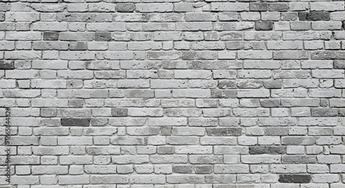 Gray brick wall texture showing varied shades of gray and mortar. Detailed close-up of a brick wall perfect for background use in advertising or editorial projects.