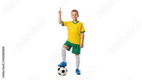 Youthful Soccer Player with Determination: A young, spirited soccer player, clad in a bright yellow and green uniform, stands with confident posture, his foot resting on the soccer ball.