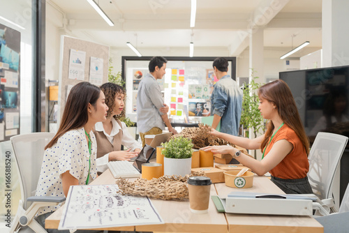Creative ESG brainstorming session for earth friendly reuse recycle packaging campaign. Team develops viral environmental social impact strategy through sustainable innovation purpose driven marketing