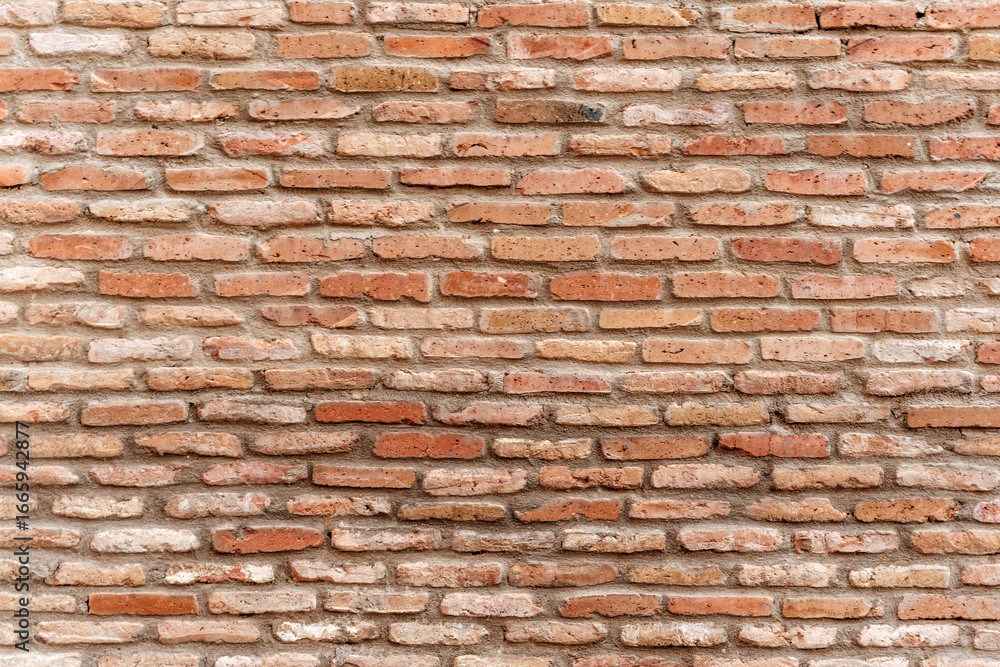 Naklejka premium Old brick wall background. Old grunge brickwork
