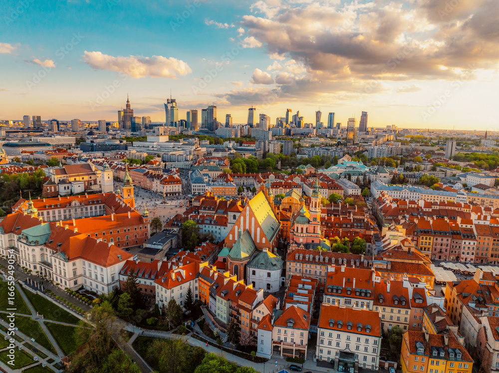 Fototapeta premium Warsaw old city center and skyscrapers in the background Vistula river. Sunset in Warsaw city center aerial view.