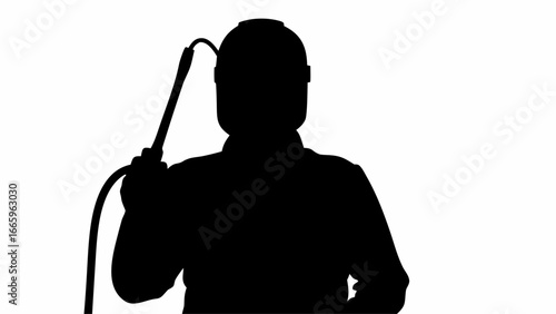 Silhouette of a welder with a welding mask and equipment in black and white against a plain background