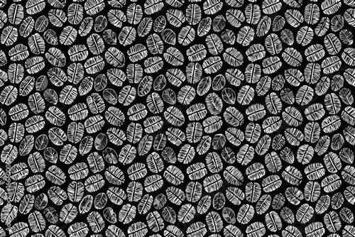 A seamless pattern of small gray stones on a black background texture