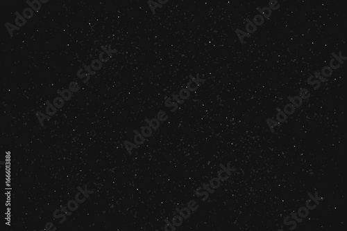 A clear night sky with many small white stars in black space