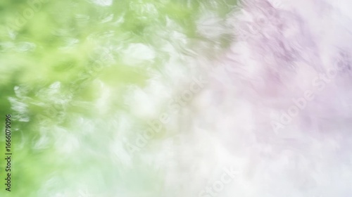 Abstract dreamy background with blurred motion effect featuring pastel colors like green and